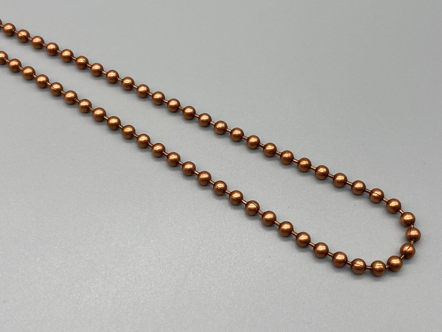Endlose Metallkette aus antikem Kupfer – Perlengröße Nr. 10: 4,5 mm Öse