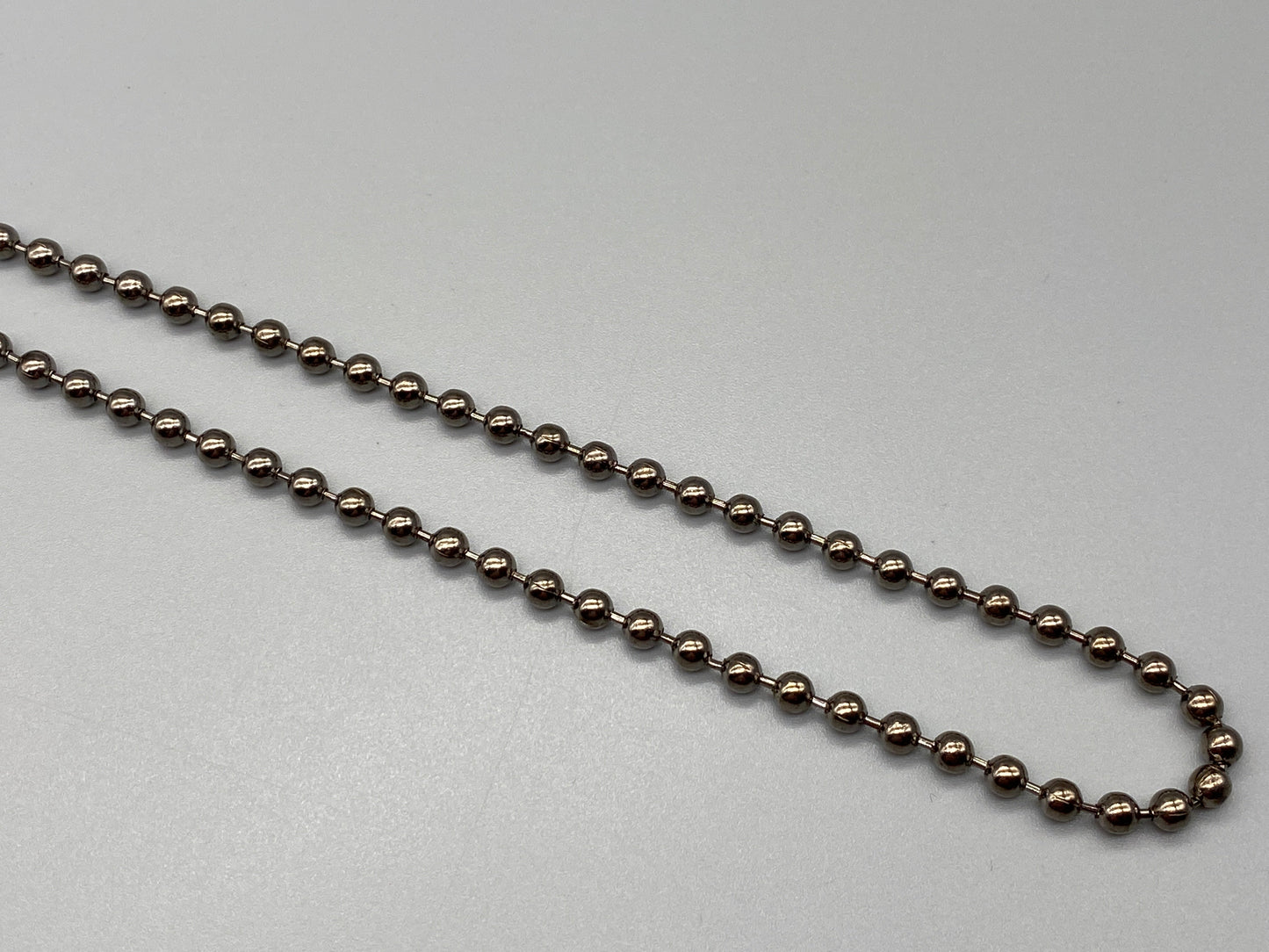 Chaîne en bronze - N° 10 Taille des perles : 4,5 mm + connecteur gratuit